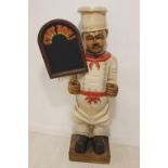 Model of Chef with menu board