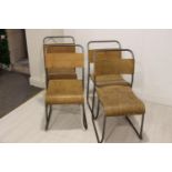 Set of four metal and wood stacking chairs