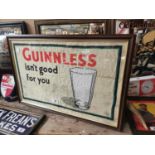 Framed Guinness advertising tea towel