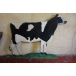 Painted wooden model of Cow.