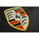 Porsche advertising plaque.