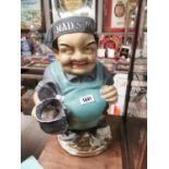 Ceramic beer advertising figure