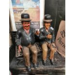 Composition model of Laurel and Hardy seated on bench