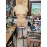19th. C. shop mannequin mounted on a wooden stand