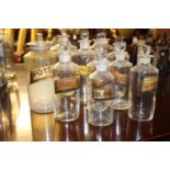 Collection of ten glass chemist bottles.