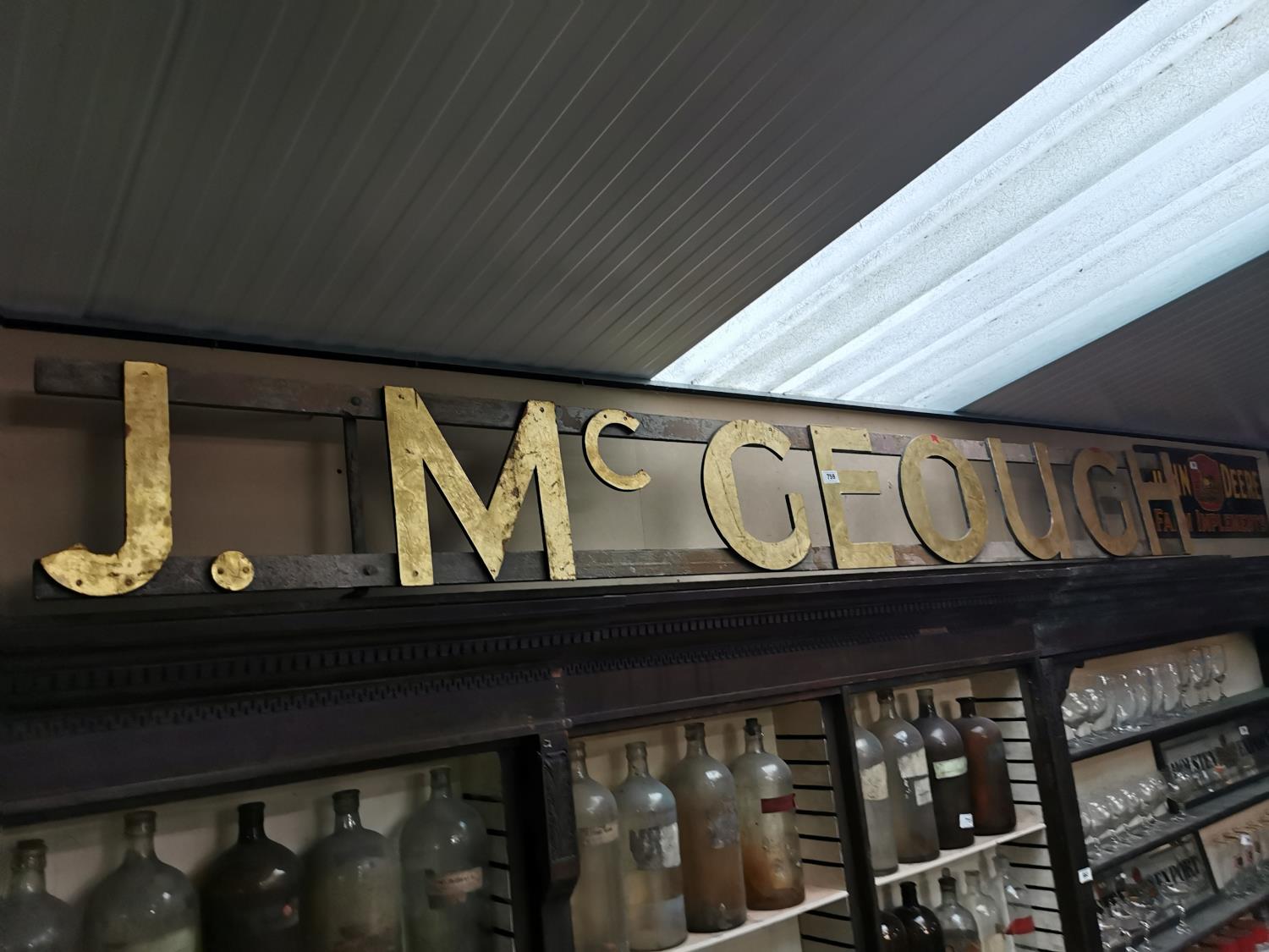 J McGeough shop sign.