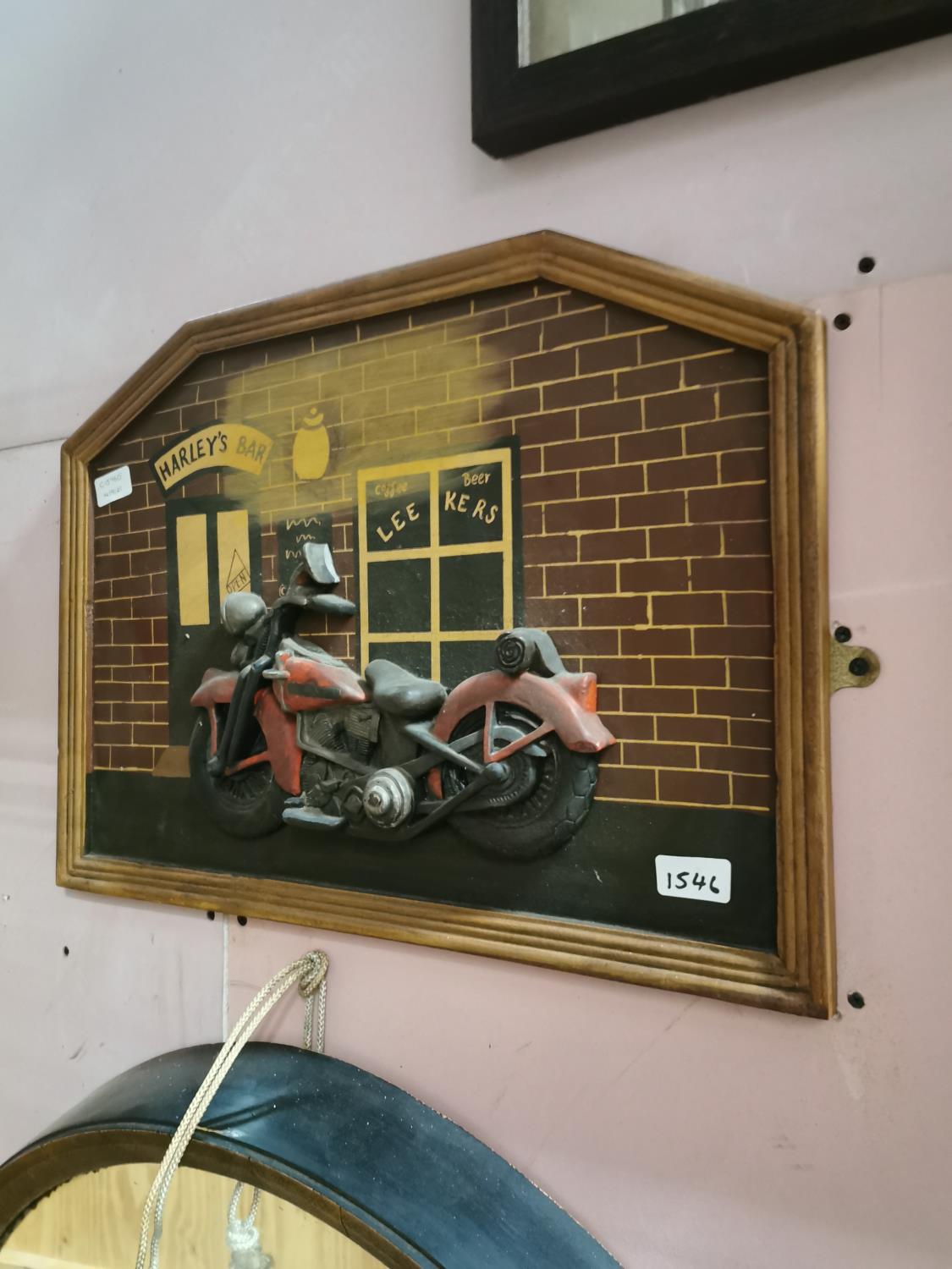 Harley Davidson Motorcycles advert on board.