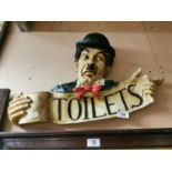 Plaster wall plaque Toilet sign depicting Charlie Chaplin
