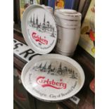 Two Carlsberg tin plate advertising drinks trays