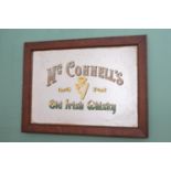 McConnell's old Irish whiskey Advertising mirror in oak frame.