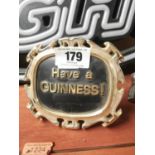 Have a Guinness Shelf Sign.