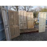 Large collection of painted pine panelled doors.