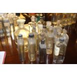 Collection of sixteen glass chemist bottles.