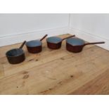 Set four 1950's enamel saucepans.