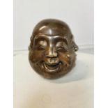 Bronze buddha paperweight.