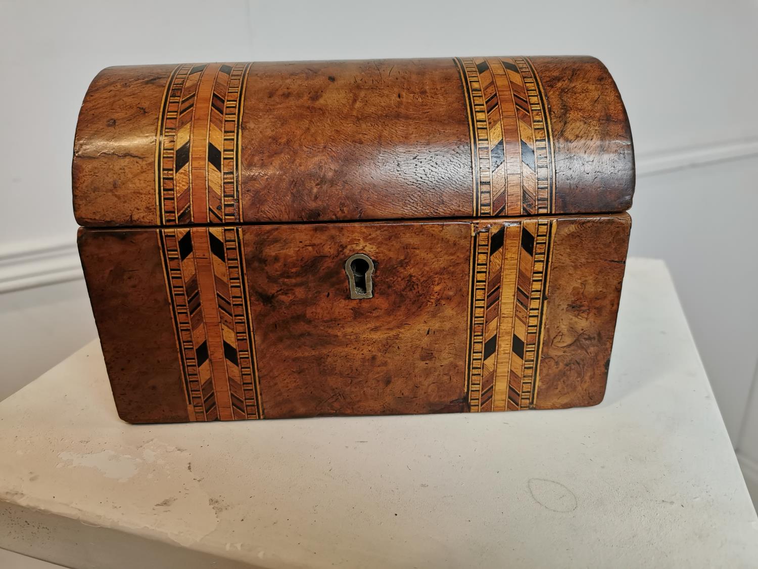 19th C. inlaid walnut dome topped tea caddy.