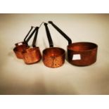 Set of five graduated hand beaten copper sauce saucepans {