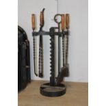 Set of wrought iron fire irons