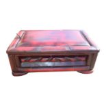 Leather upholstered footstool with lid.