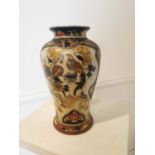 Early 20th C. hand painted Oriental ceramic vase.
