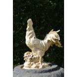 Cast iron model of a Rooster.