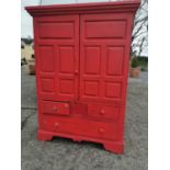 Painted pine chess press with raised panelled door.