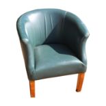 Green leather upholstered tub chair.