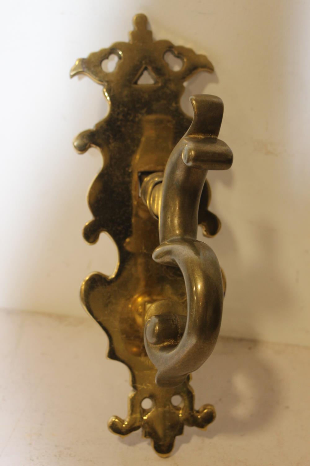 Large brass scroll decorated door knocker