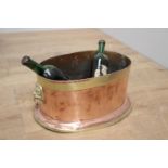 Brass and copper wine bucket.