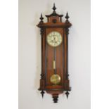 19th C. Walnut and ebony Vienna wall clock.