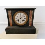 19th C. marble and slate mantle clock with enamel dial.