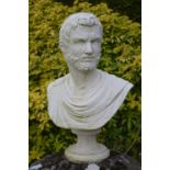 Moulded stone Roman bust on circular base.