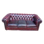 Leather upholstered deep buttoned three seater Chesterfield sofa