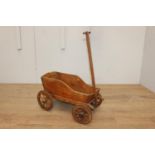 Child's wooden cart with wood and steel wheels