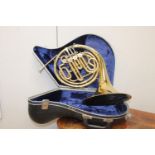 Cased Paxman French Horn.