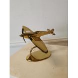 Brass model of a Spitfire.