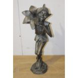 Bronze water feature in the form of a Pixie