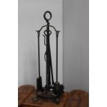 Wrought iron set of fire irons.