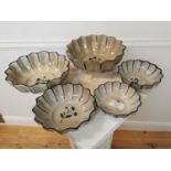 Set of five graduated ceramic bowls.