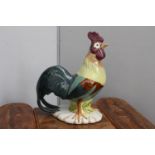Ceramic model of a Rooster.