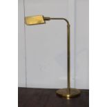 Adjustable brass desk lamp.