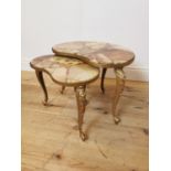 Nest of two gilded metal lamp tables