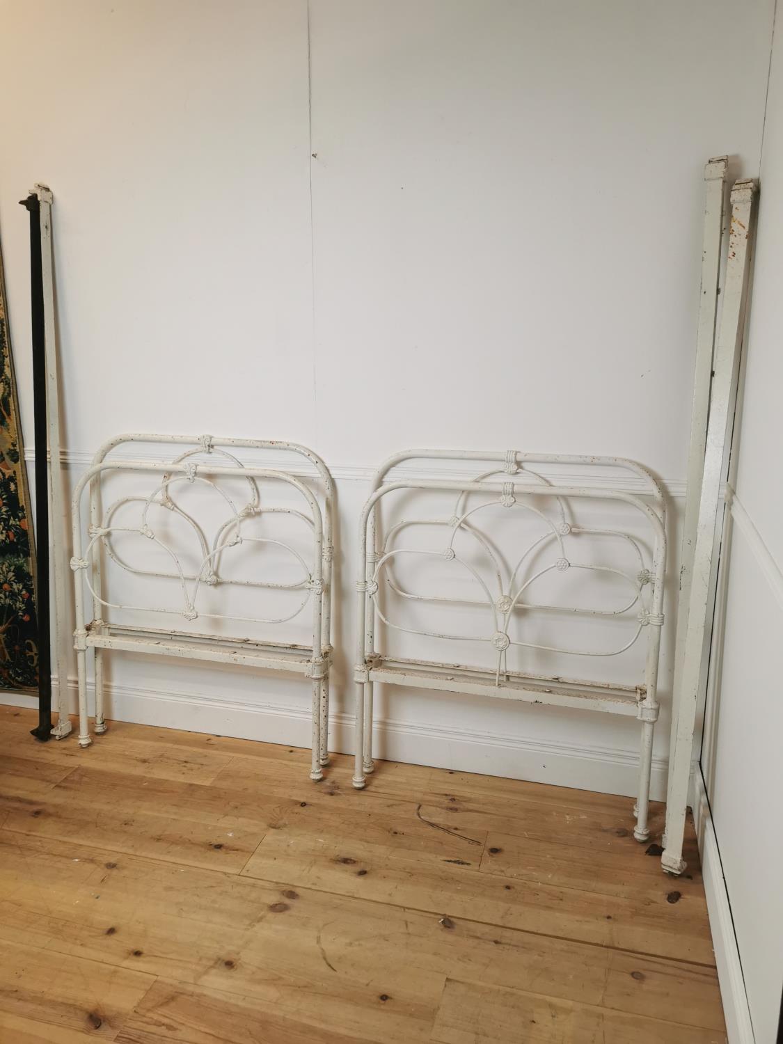 Pair of early 20th C. cast iron single beds. {