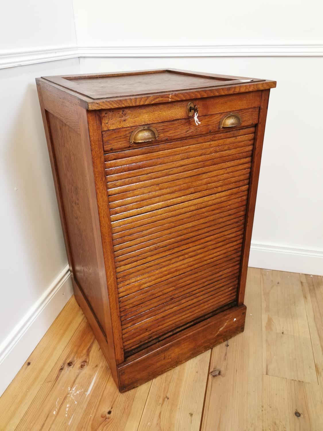 Early 20th. C. oak office cabinet with tambour door