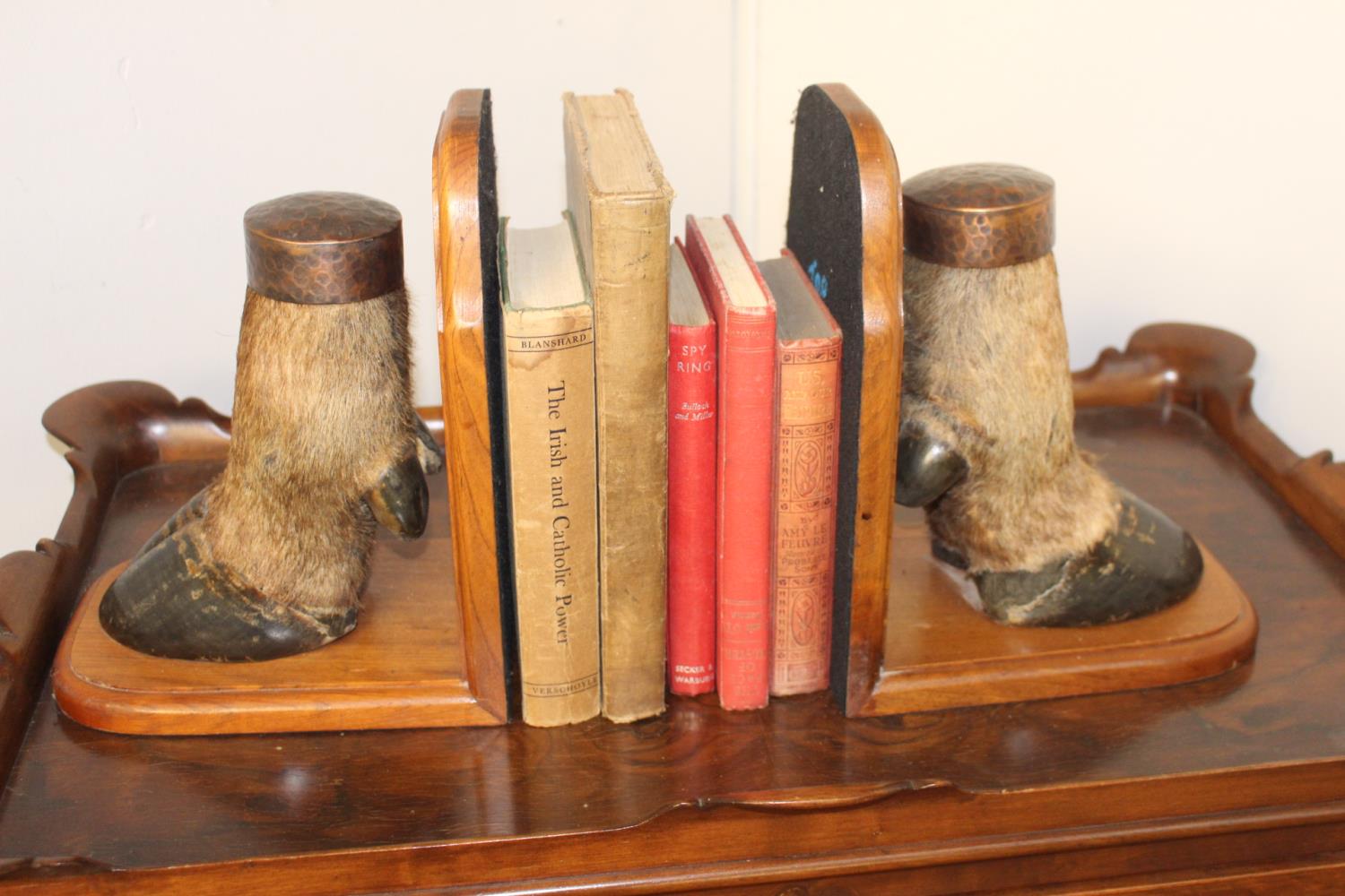 Pair of bookends with Hoof decoration.