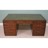 Large mahogany pedestal desk with inset leather top