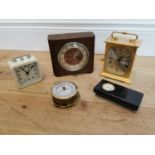 Collection of five retro desk clocks.