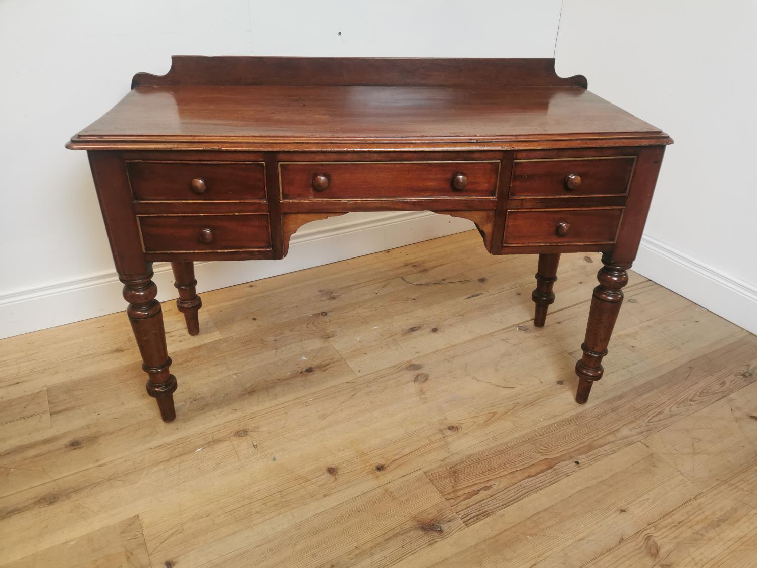 19th C. mahogany desk on turned legs