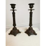 Pair of bronze candlesticks in the Rococo style.