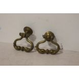 Pair of ornate brass door handles.